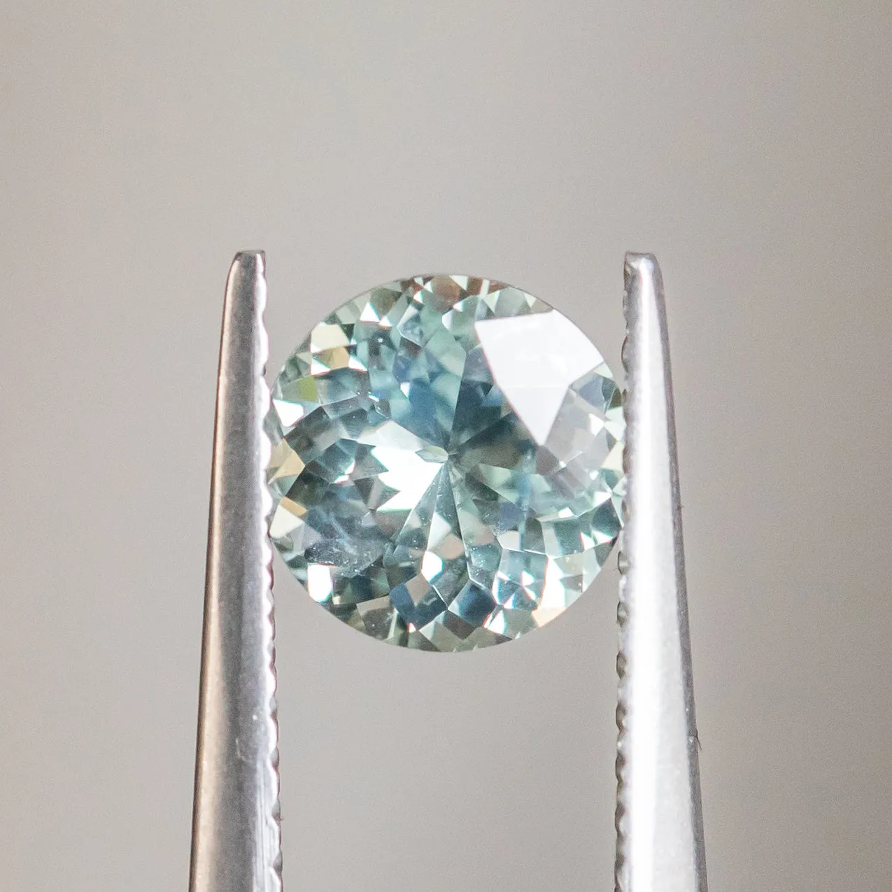 1.03CT ROUND MONTANA SAPPHIRE, PLATINUM WITH TEAL, 6.2MM, UNTREATED