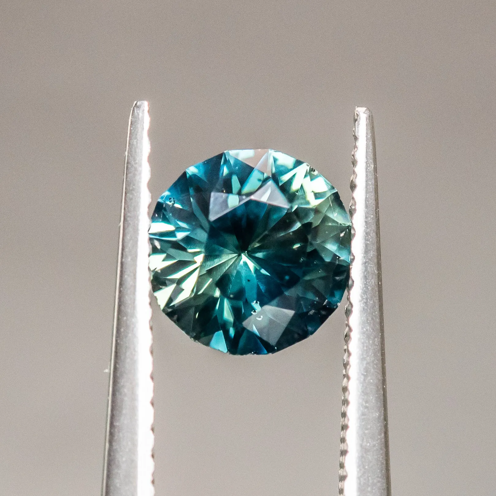 1.63CT ROUND NIGERIAN SAPPHIRE, PEACOCK TEAL BLUE GREEN, 7.01x4.50MM, UNTREATED