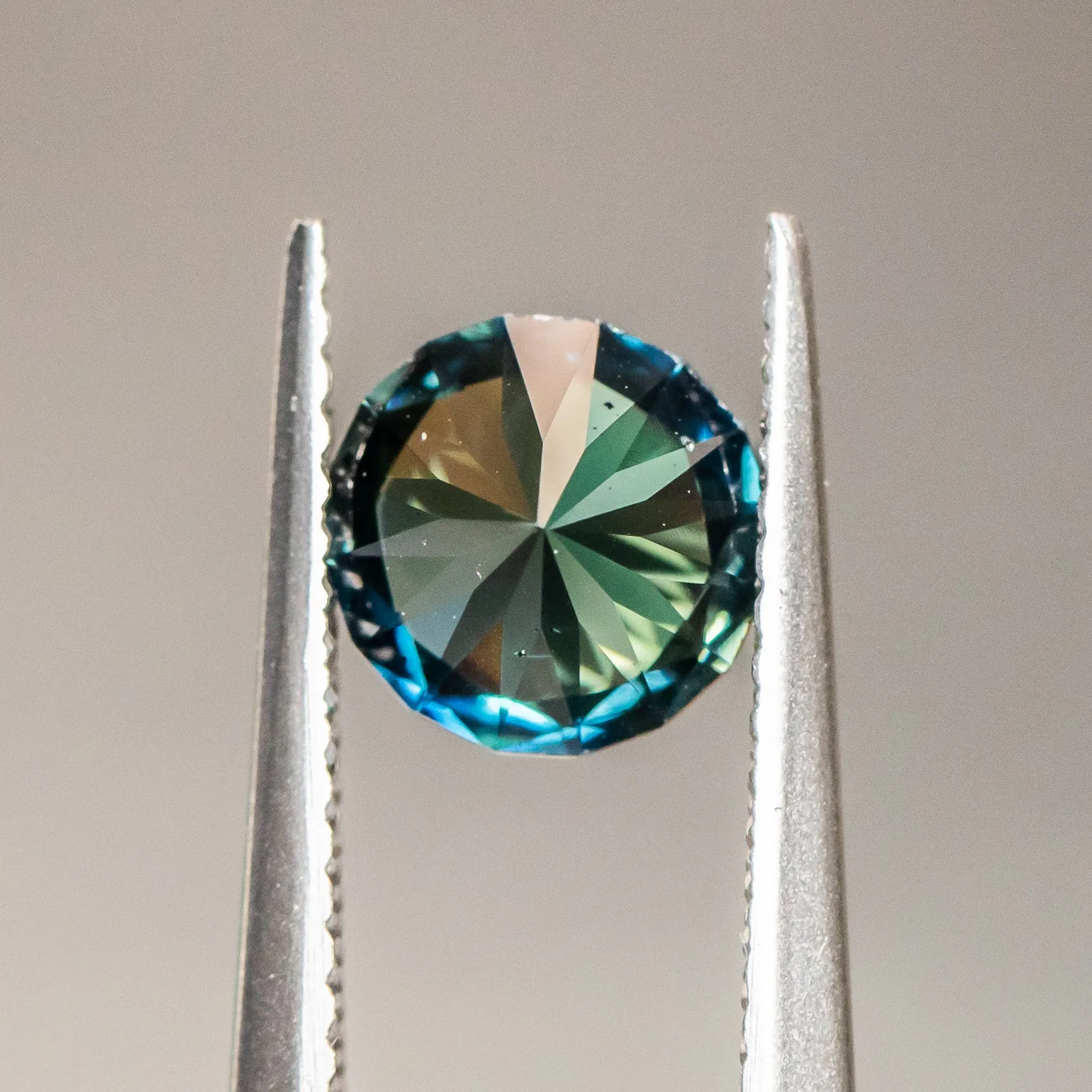 1.63CT ROUND NIGERIAN SAPPHIRE, PEACOCK TEAL BLUE GREEN, 7.01x4.50MM, UNTREATED